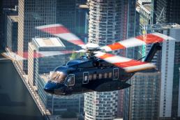 white and blue helicopter